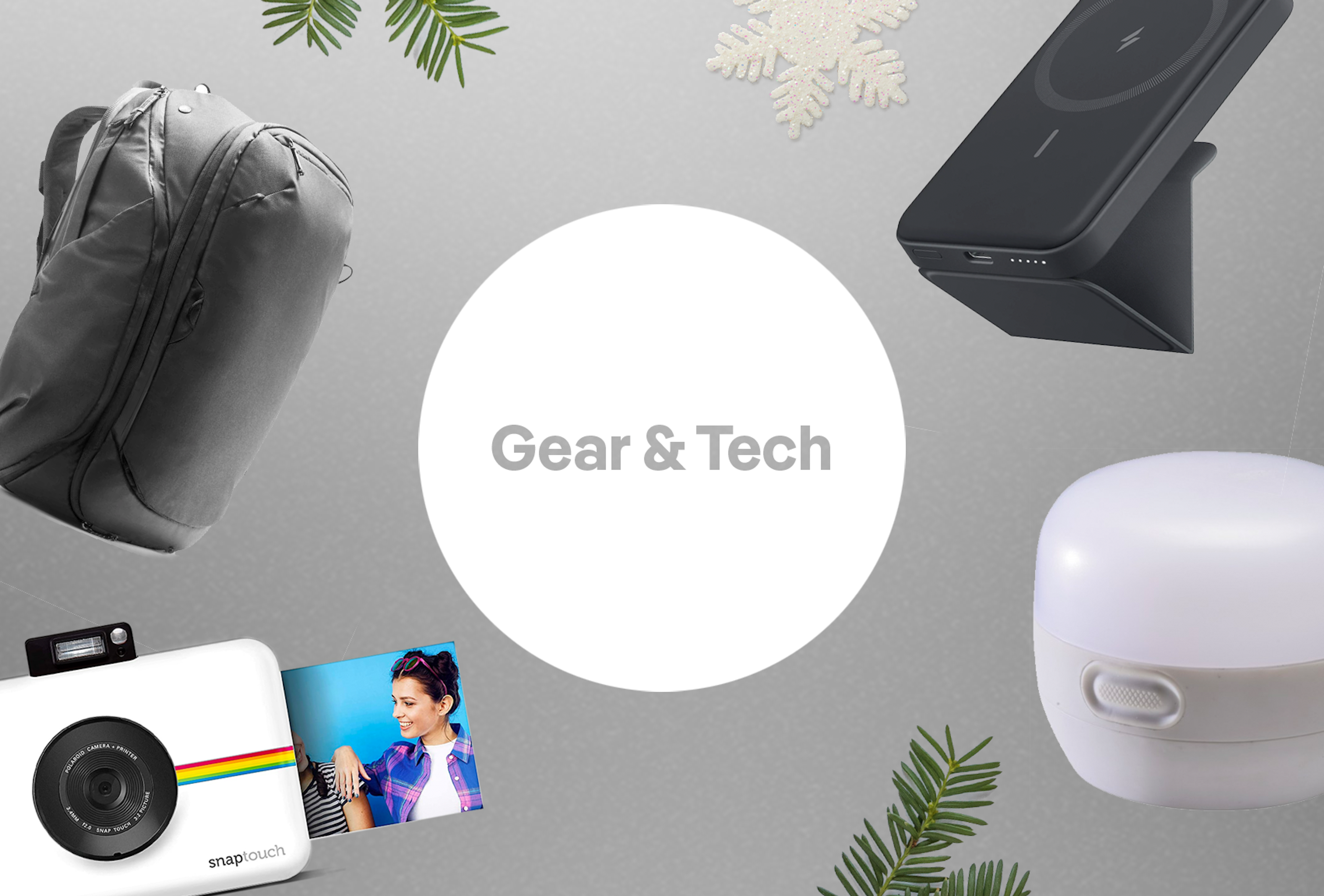 A grey background with a white circle in the center. Inside the circle are the words Gear & Tech also in grey. Surrounding the circle are images of a black backpack, a polaroid camera and a white camping lantern